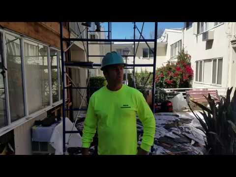 Exterior redwood siding removal.